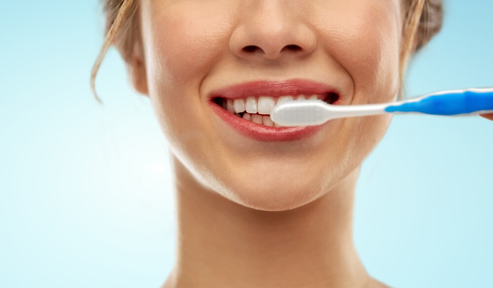come lavare i denti